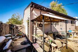 View of the side of the home where you have a door to enter the backyard