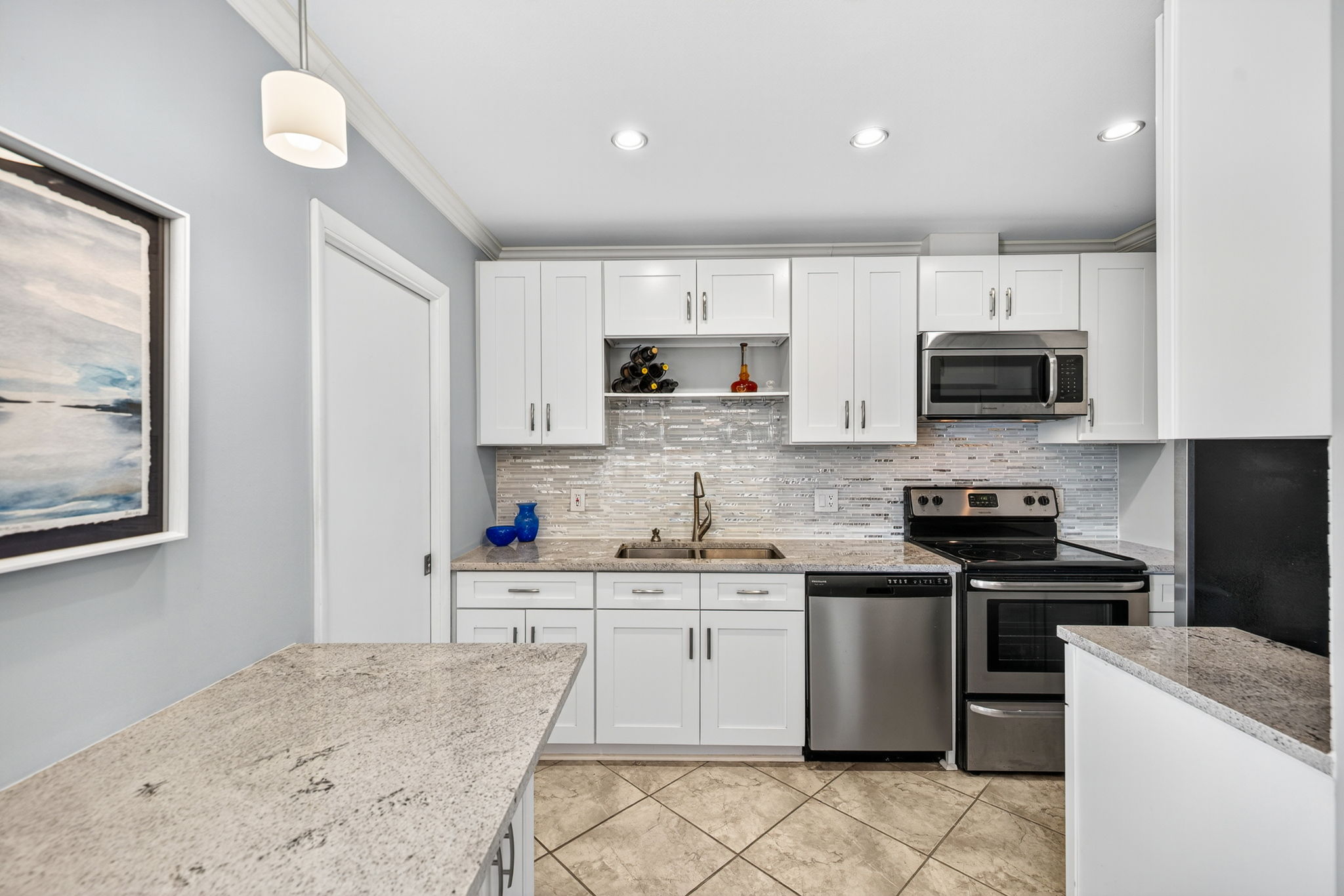 Updated with tall cabinets & beautiful granite