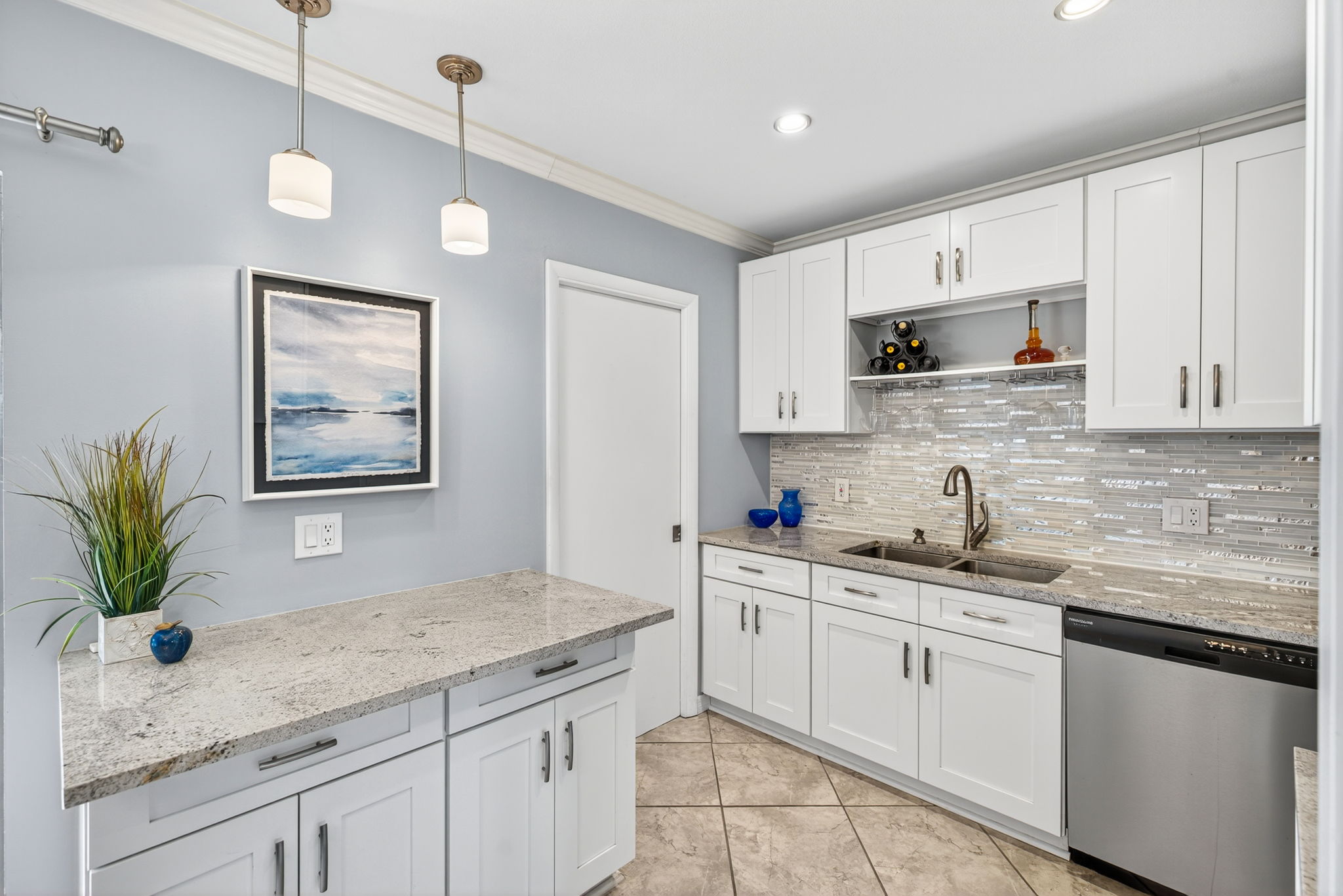 Kitchen has a full laundry adjacent