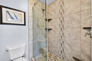 Primary bath has a spacious shower