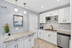 Kitchen has a full laundry adjacent