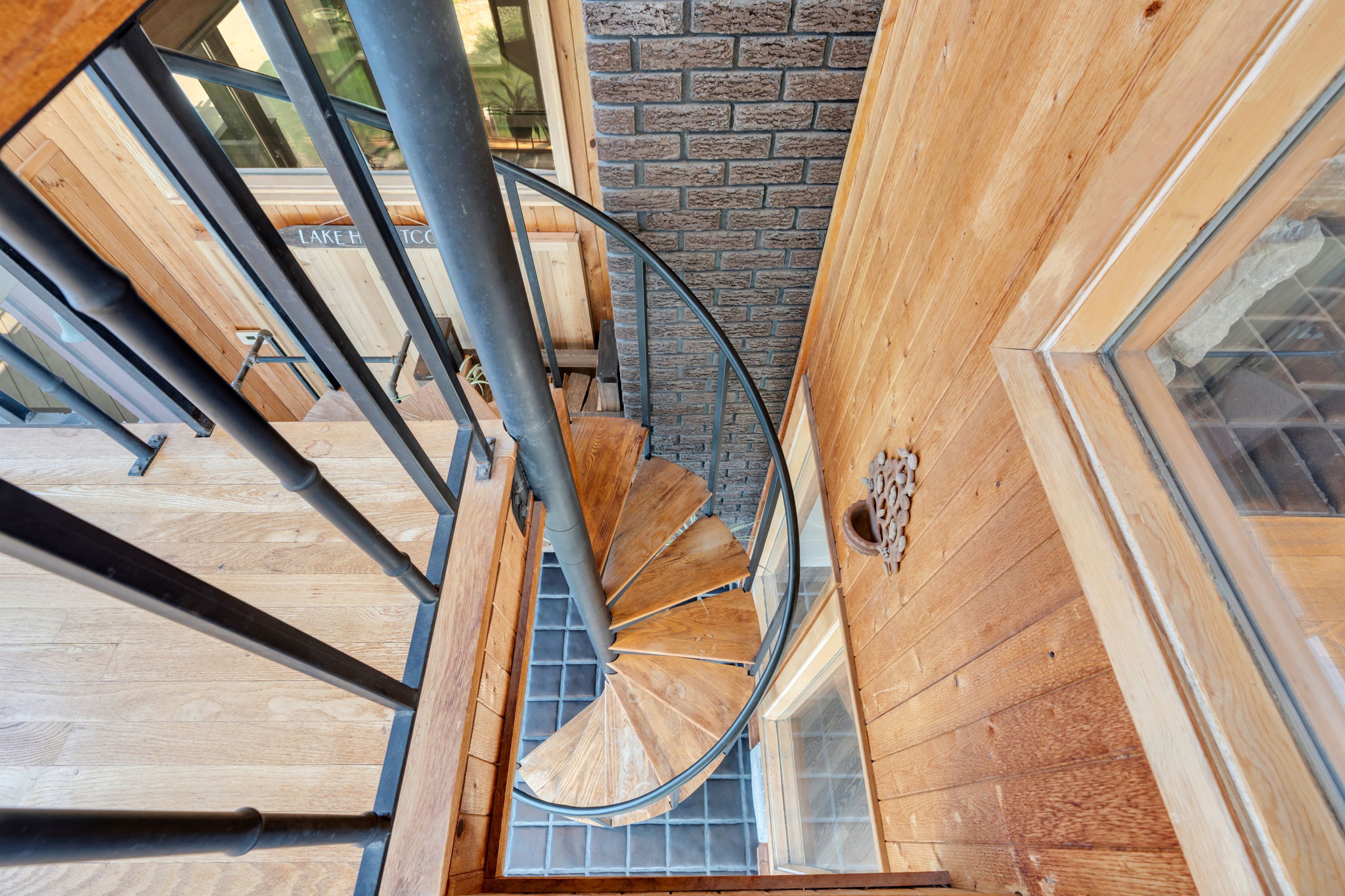 Spiral stair case returns you to the 1st floor sun room