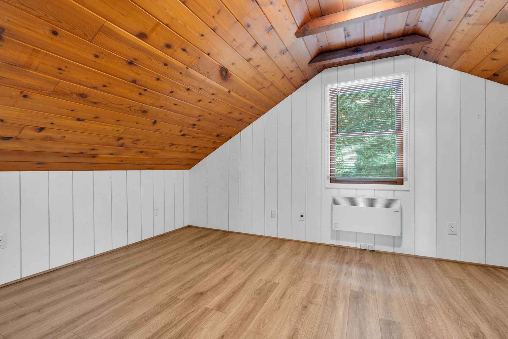 One bedroom with beam ceiling, walk-in closet