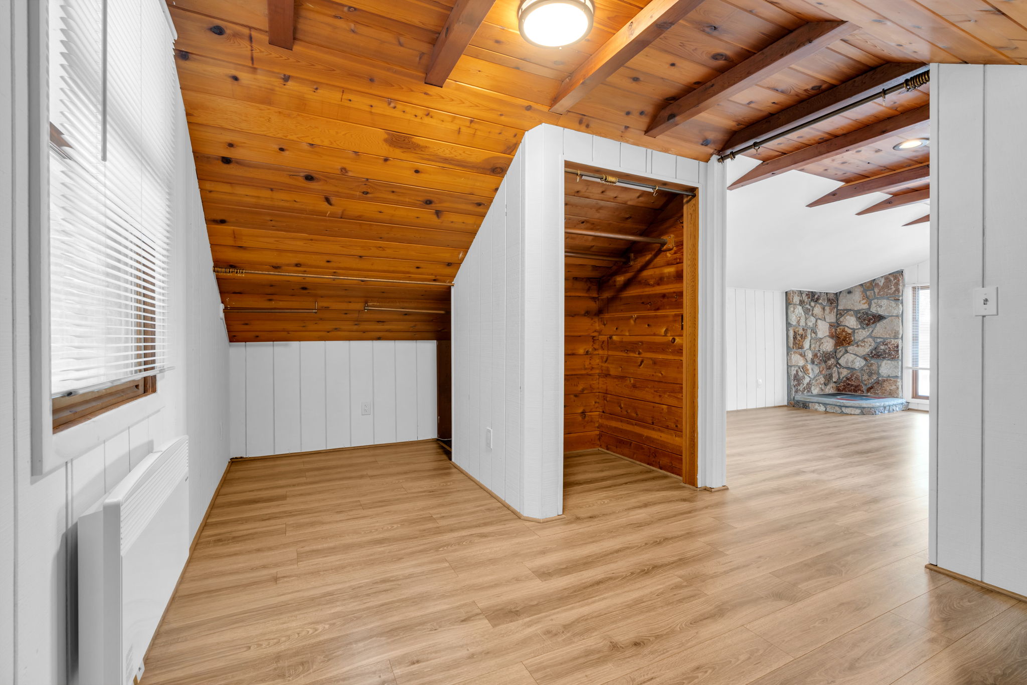 Walk-in closet and peek-a-boo views to the lake