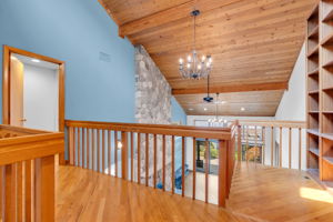 Loft with office/library, entry door to primary bedroom