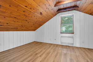 One bedroom with beam ceiling, walk-in closet