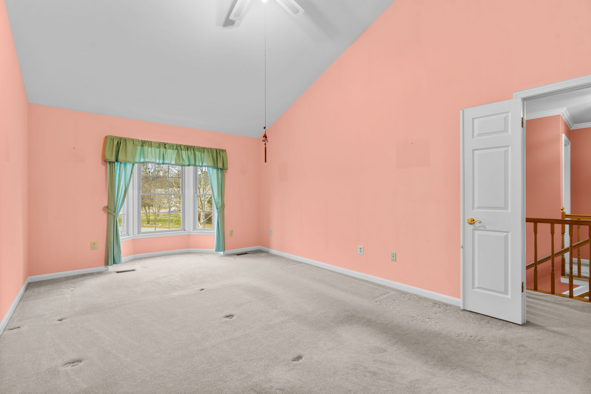 Primary Bedroom with Vaulted Ceiling