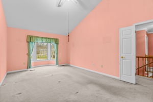 Primary Bedroom with Vaulted Ceiling