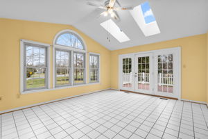 Sun Room with Cathedral Ceiling and Skylights
