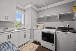 The Laundry Room! Oh My! Complete with a Window and a Sink:)