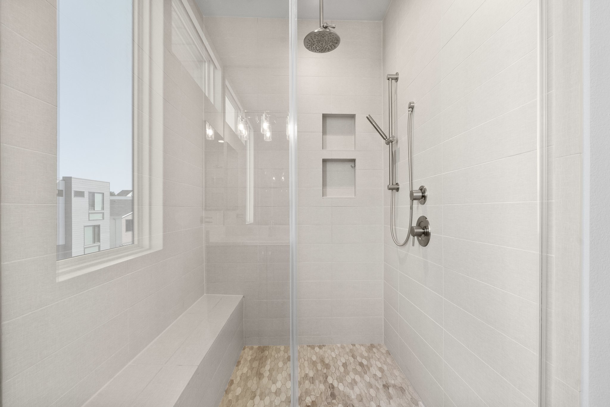Walk in Shower with Rain Head and Hand Held Spray.