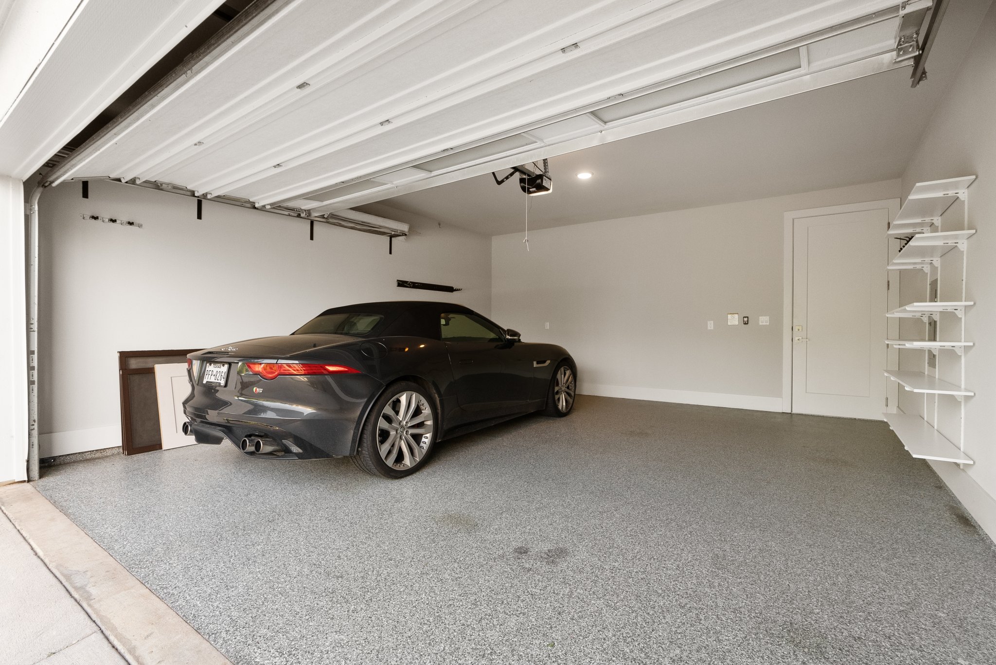 Upgraded garage with Epoxy floors and windows