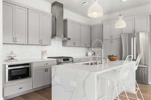 Marble mosaic backsplash adds refined Beauty