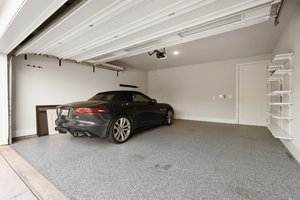 Upgraded garage with Epoxy floors and windows