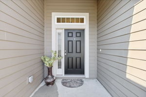 Enter through a covered, private front entrance