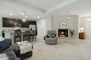 ...with contemporary lighting fixtures and ceiling fans throughout the home