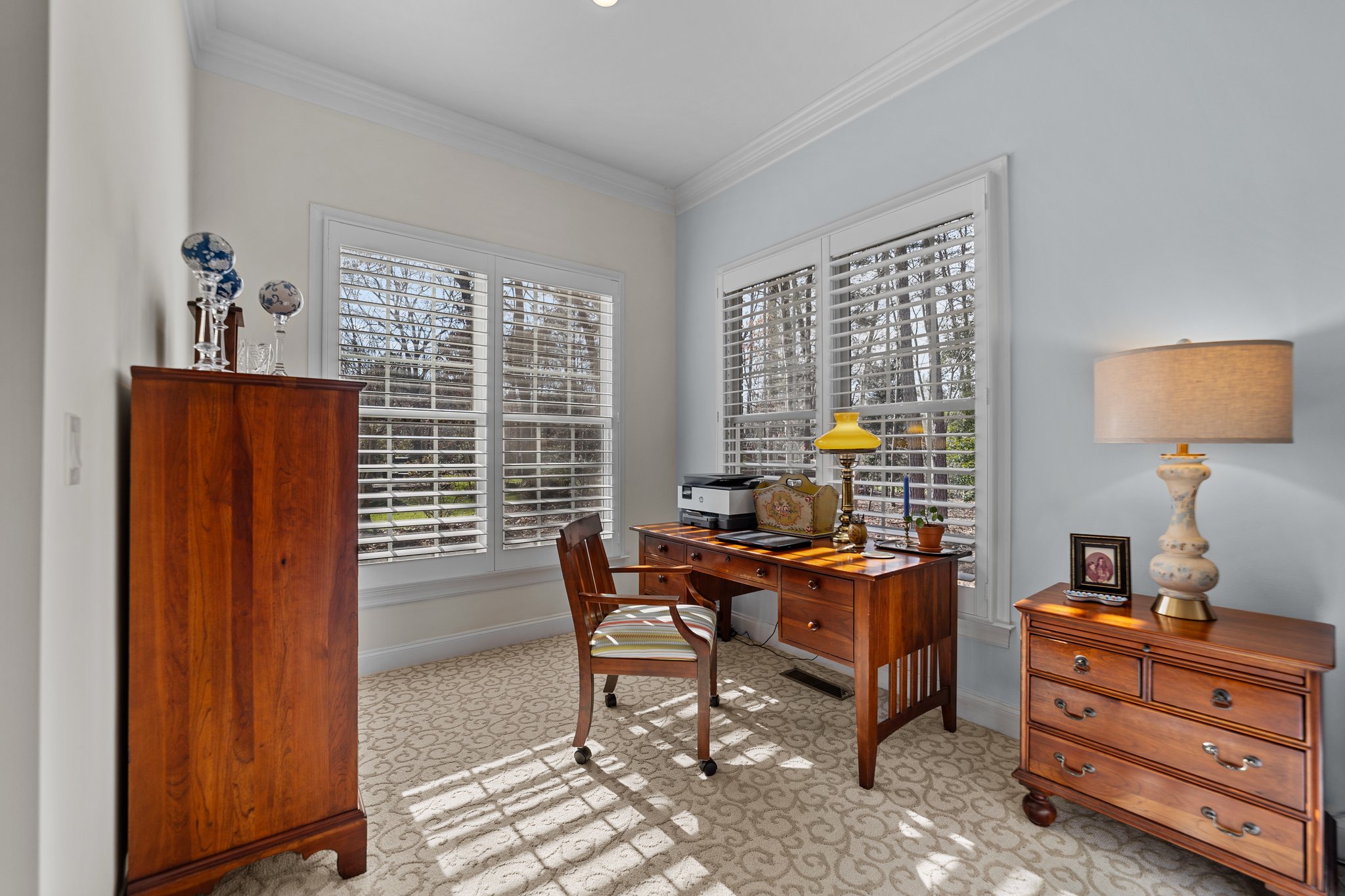Plantation shutters and wood cased windows