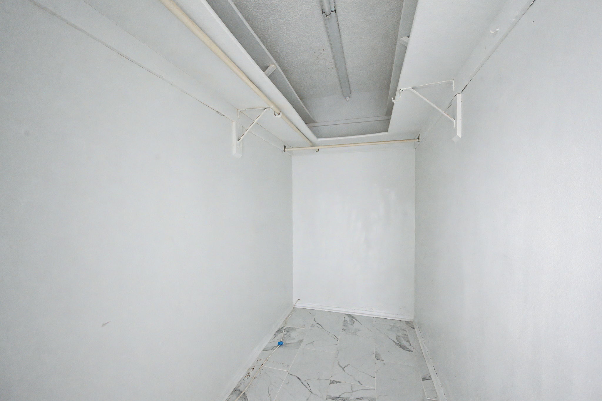 Primary Bedroom Walk-in Closet