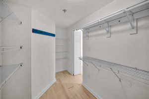 Primary Bedroom Walk-in Closet1b