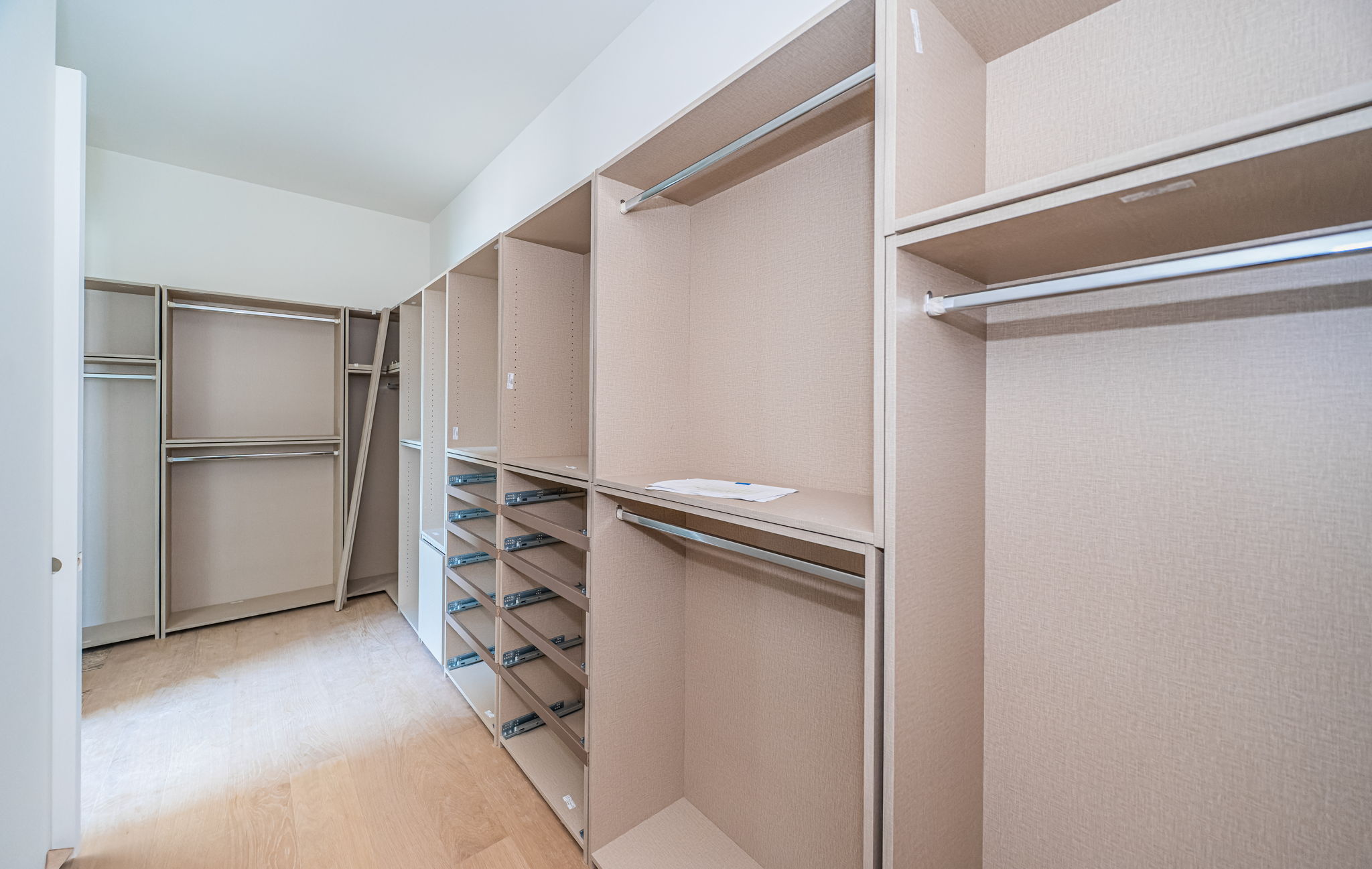 Primary Bedroom Walk-in Closet1b