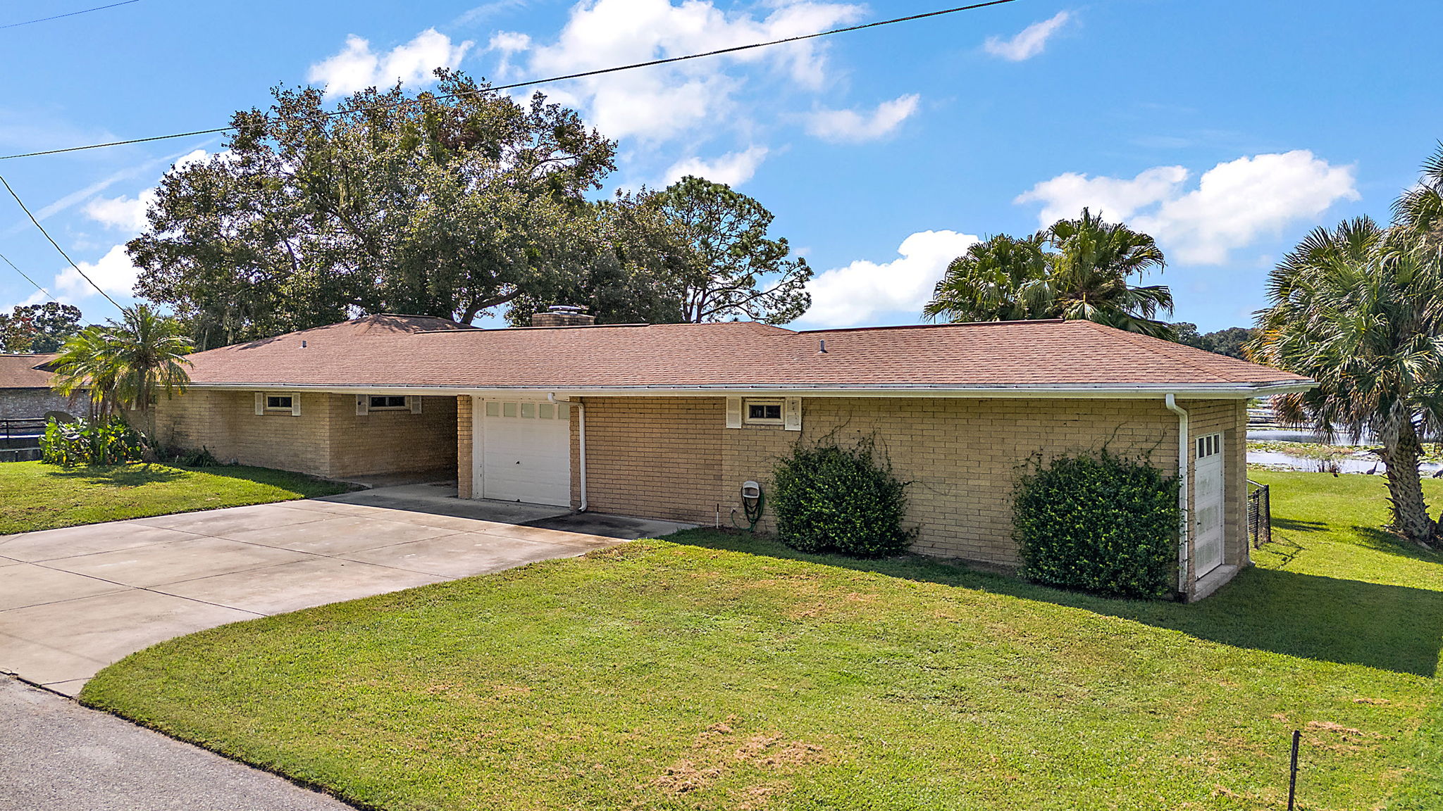 Exterior of home on .51 acres - side and back garage