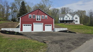 This restored barn is the focal point as you pull up the driveway