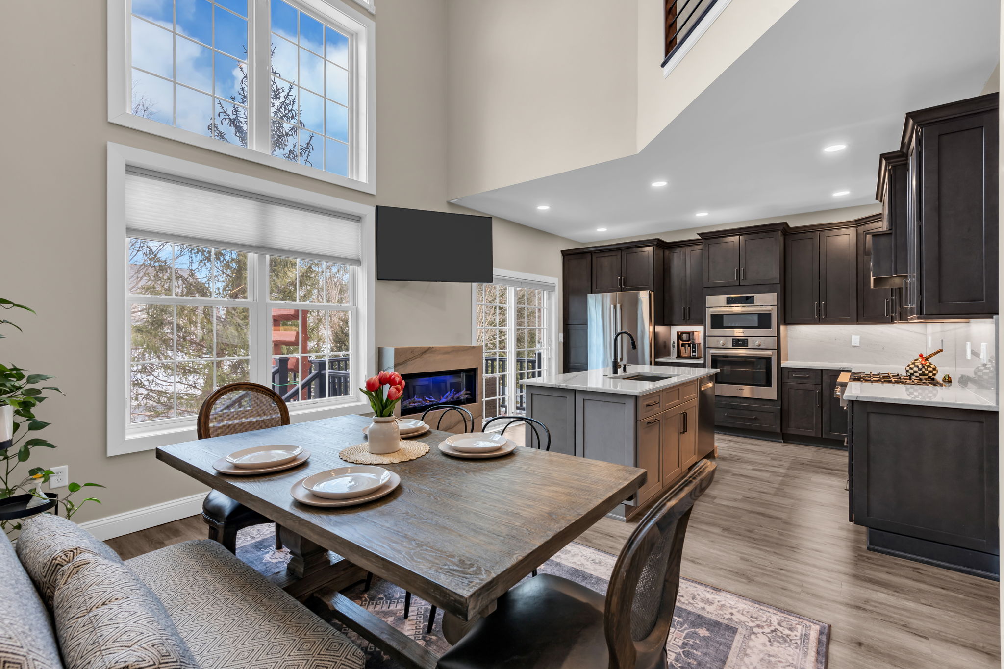 Two Story Family Room Open To Kitchen