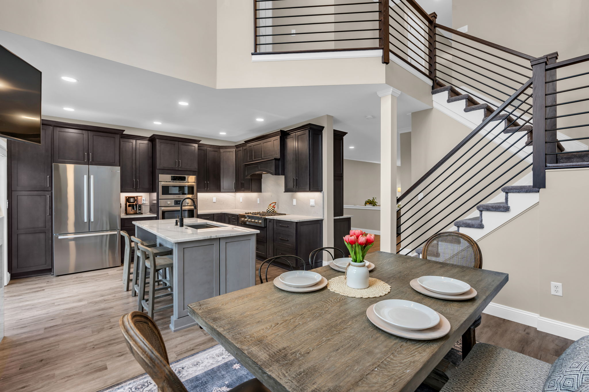 Two Story Family Room Open To Kitchen