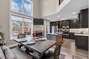 Two Story Family Room Open To Kitchen