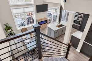 Two Story Family Room Open To Kitchen