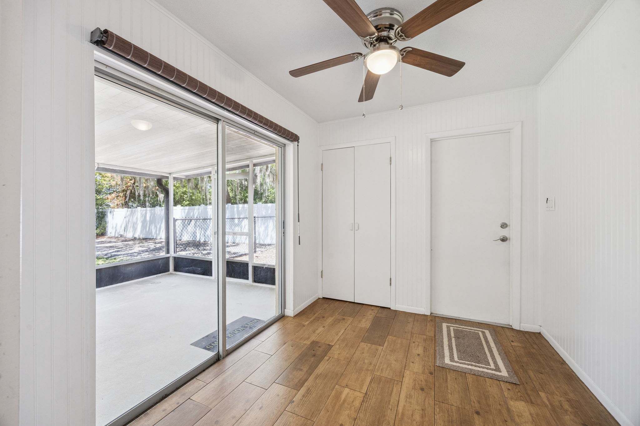 Cozy area for office with door to garage and back patio access