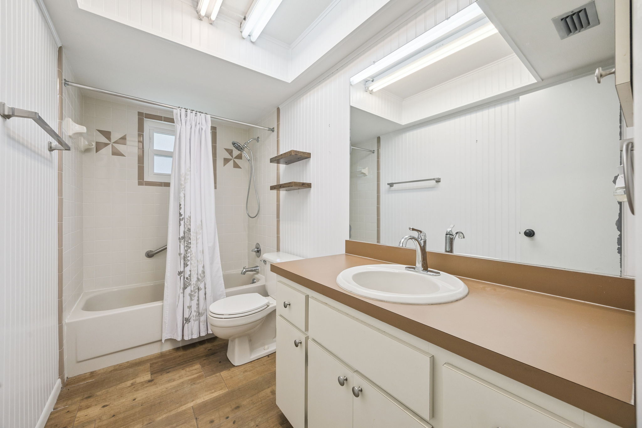 Additional bathroom with natural light.