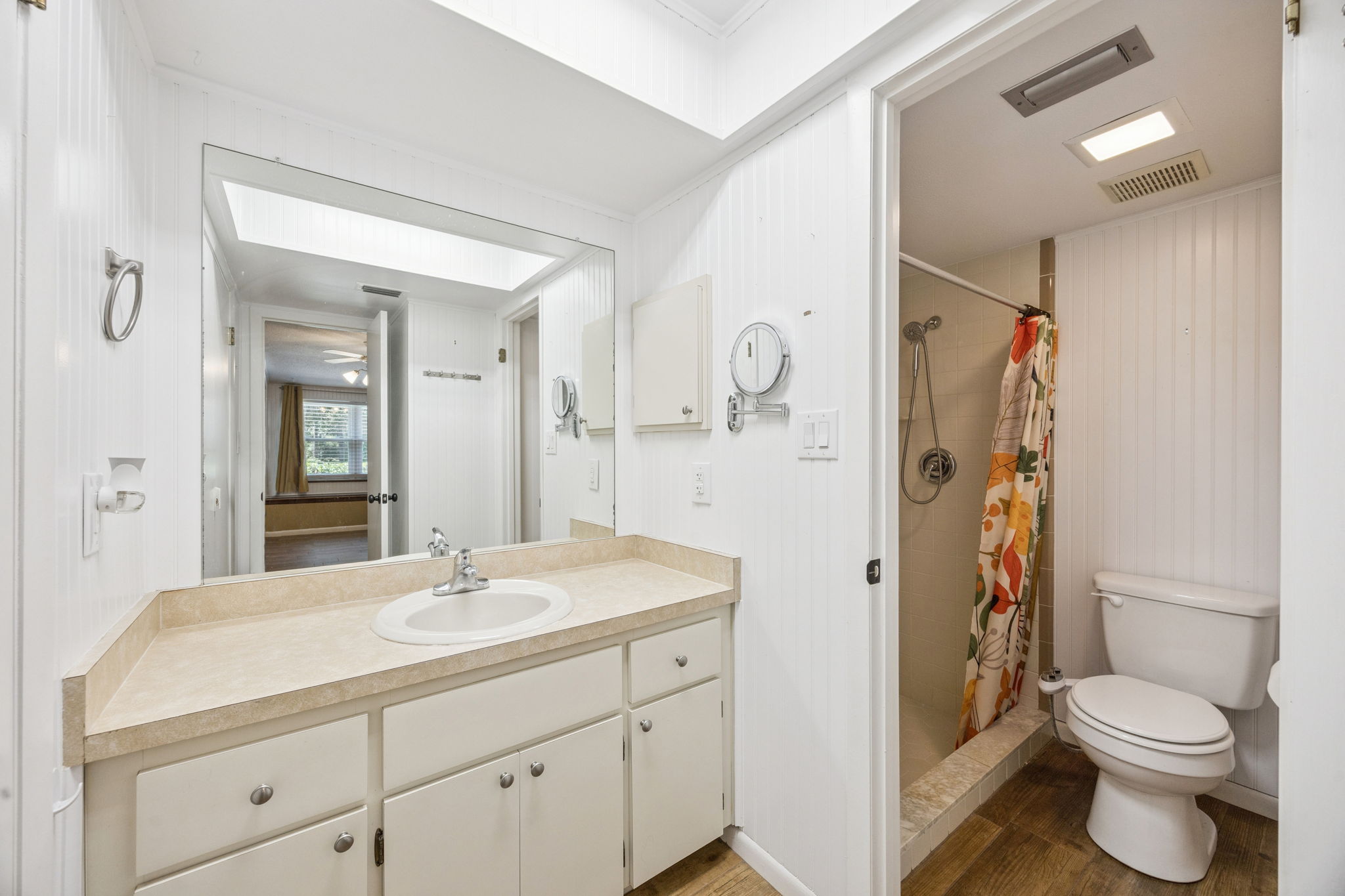 Clean and functional primary bathroom
