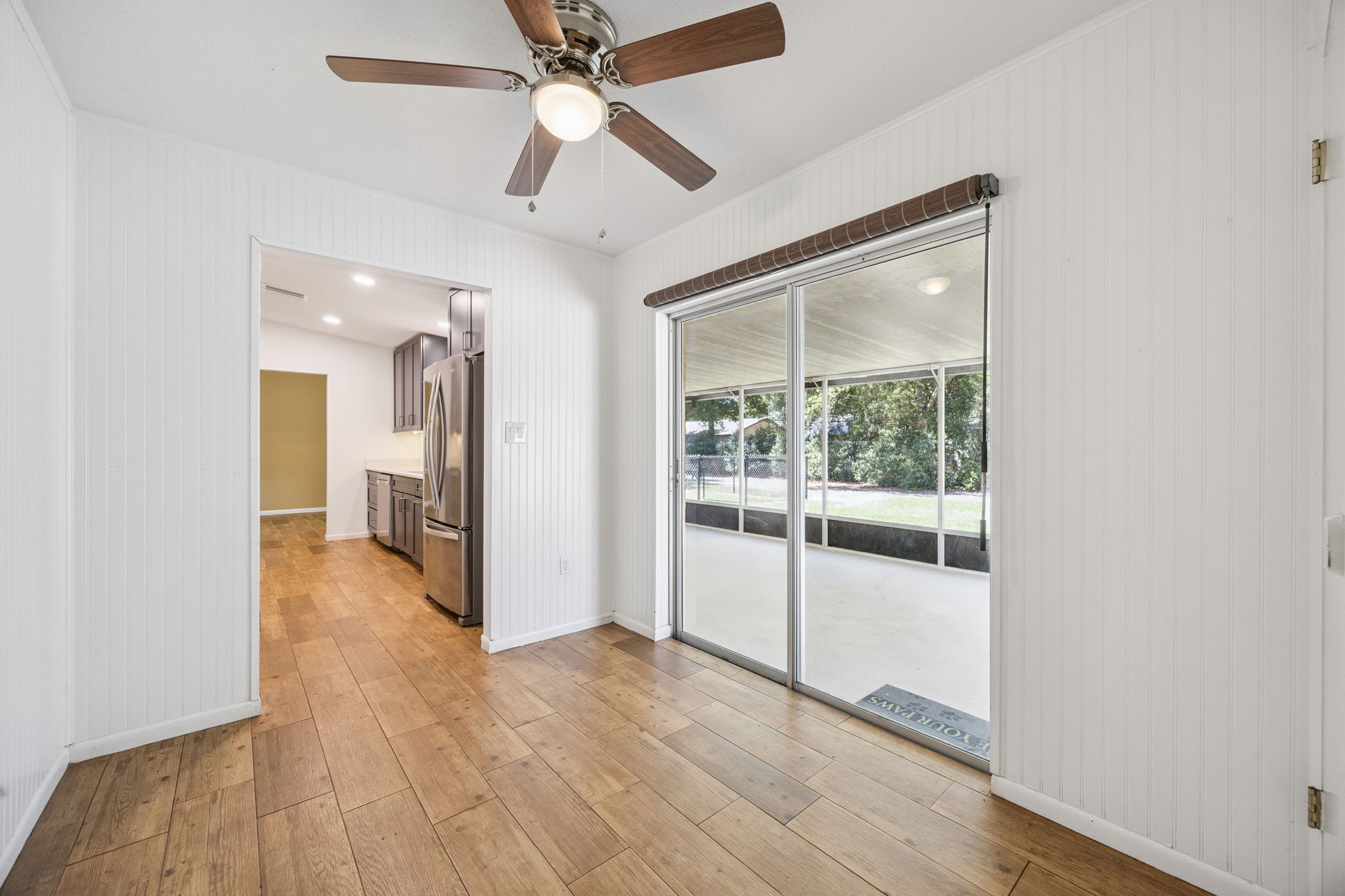 Cozy area for office with door to garage and back patio access
