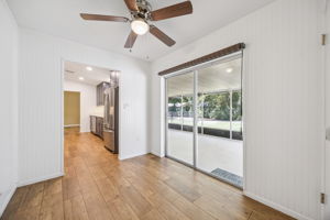 Cozy area for office with door to garage and back patio access