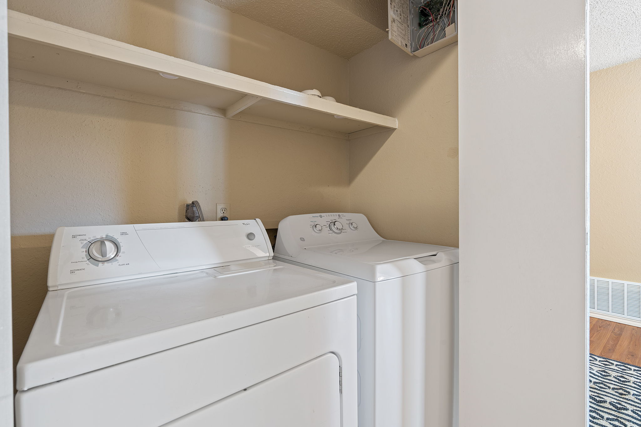 Washer/dryer in dedicated utility closet.