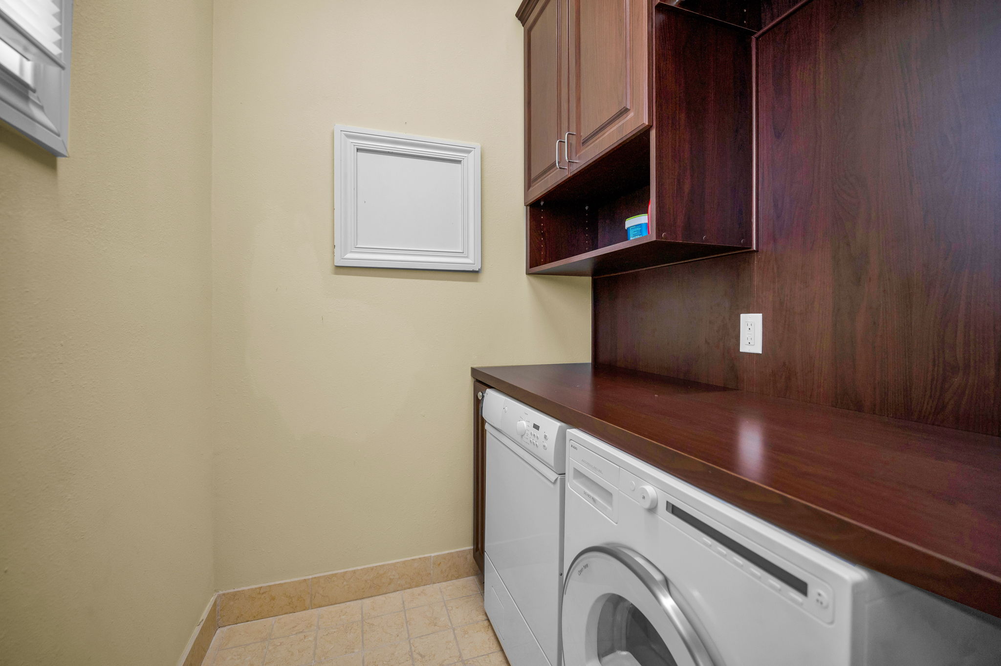 Upper Level Primary Bedroom Walk-in Closet Laundry Room