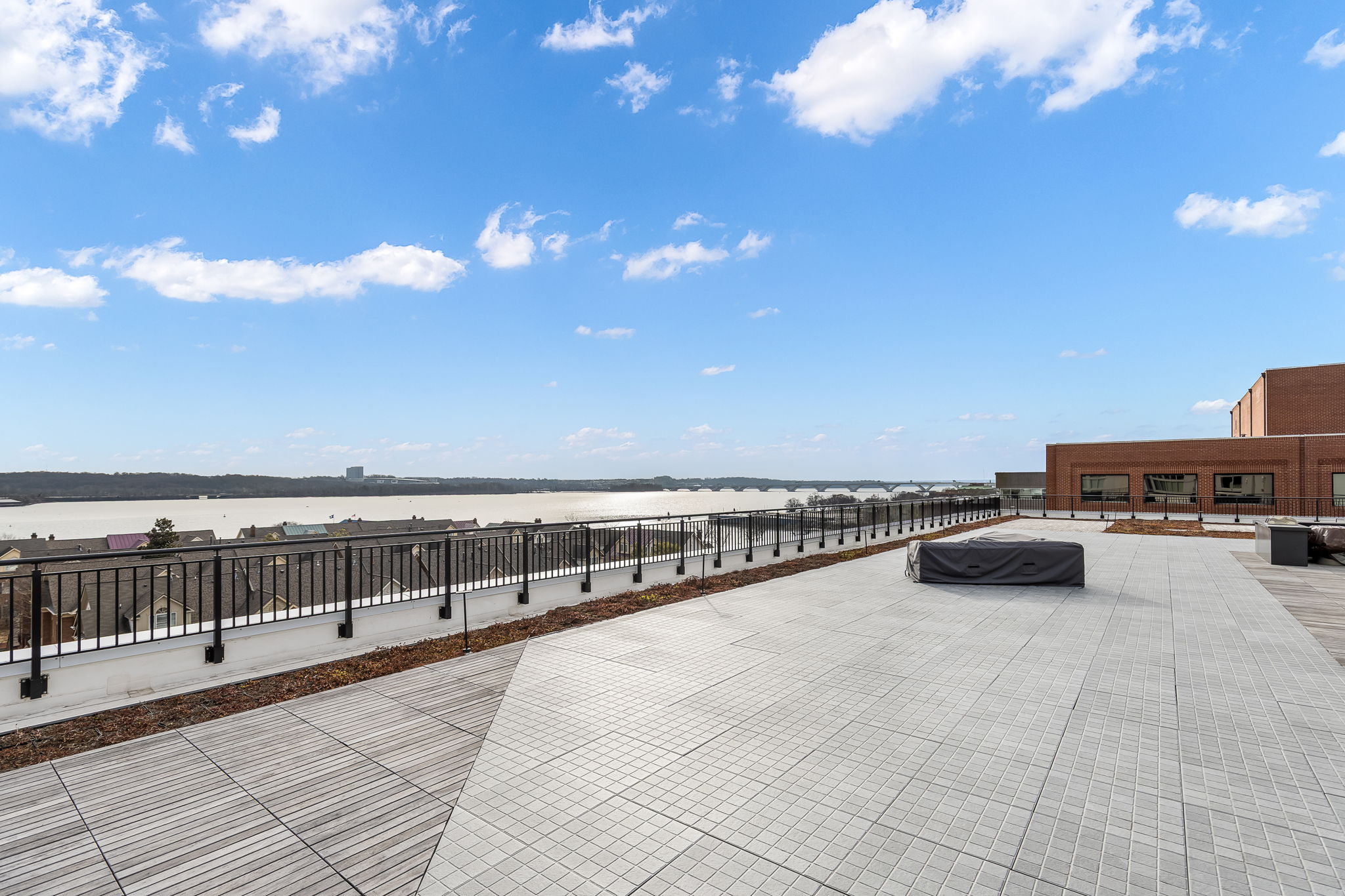 Take in expansive Potomac River views from the rooftop terrace—perfect for evening cocktails/dinner, or entertaining guests against a stunning waterfront backdrop.