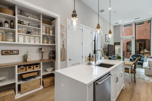Custom built-in pantry with added counter space.