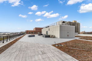 Rooftop oasis complete with outdoor grilling.