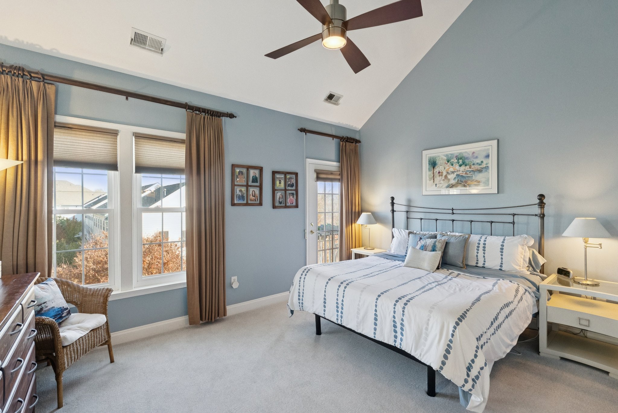 Main Level Primary Bedroom with Juliette Balcony and Dual Walk-in Closets