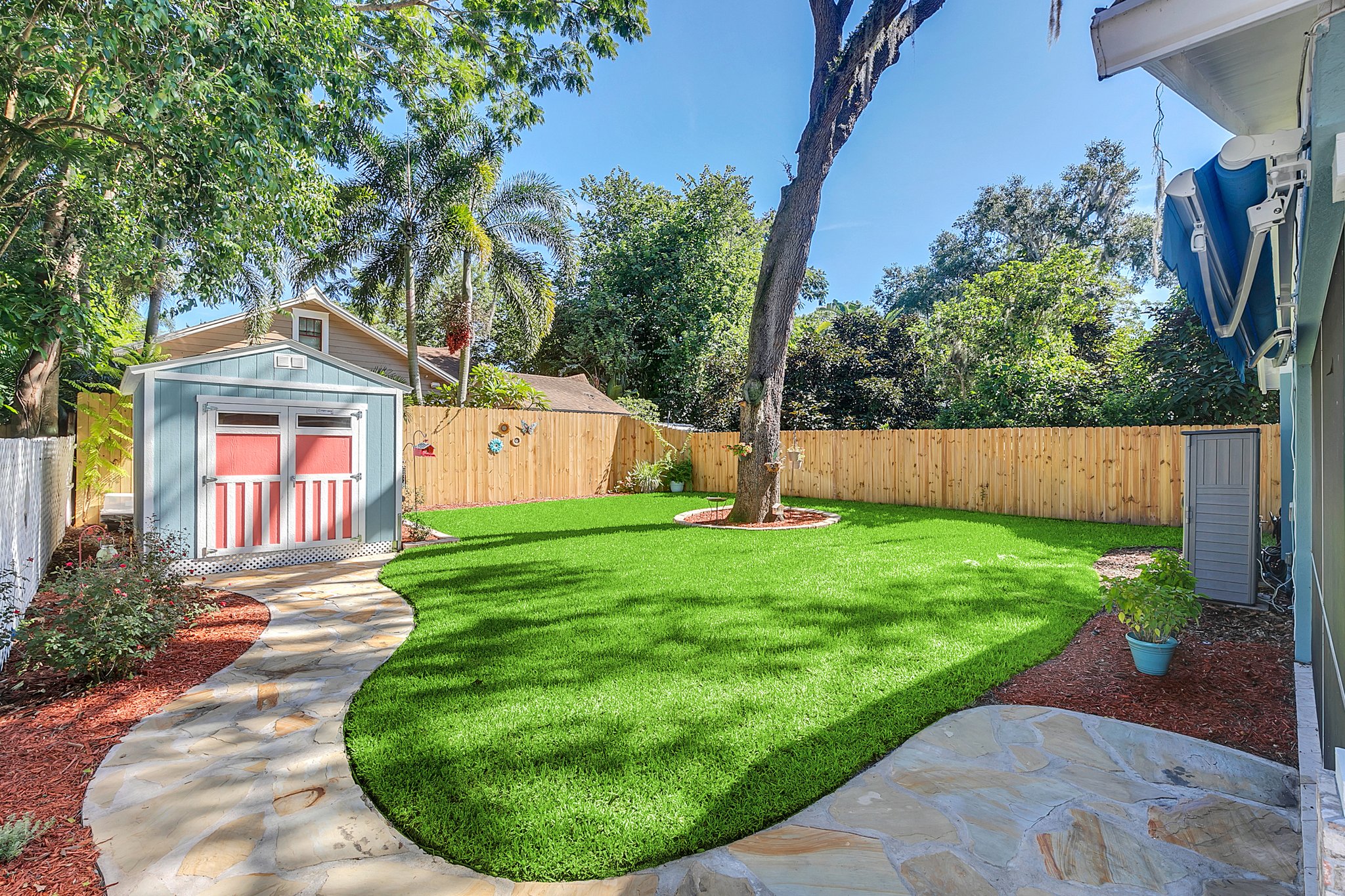 Newly re-landscaped Backyard with new flagstone walkway