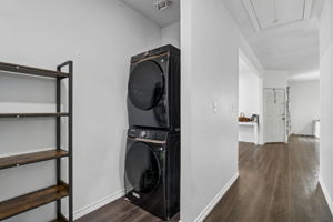 Laundry area with storage .