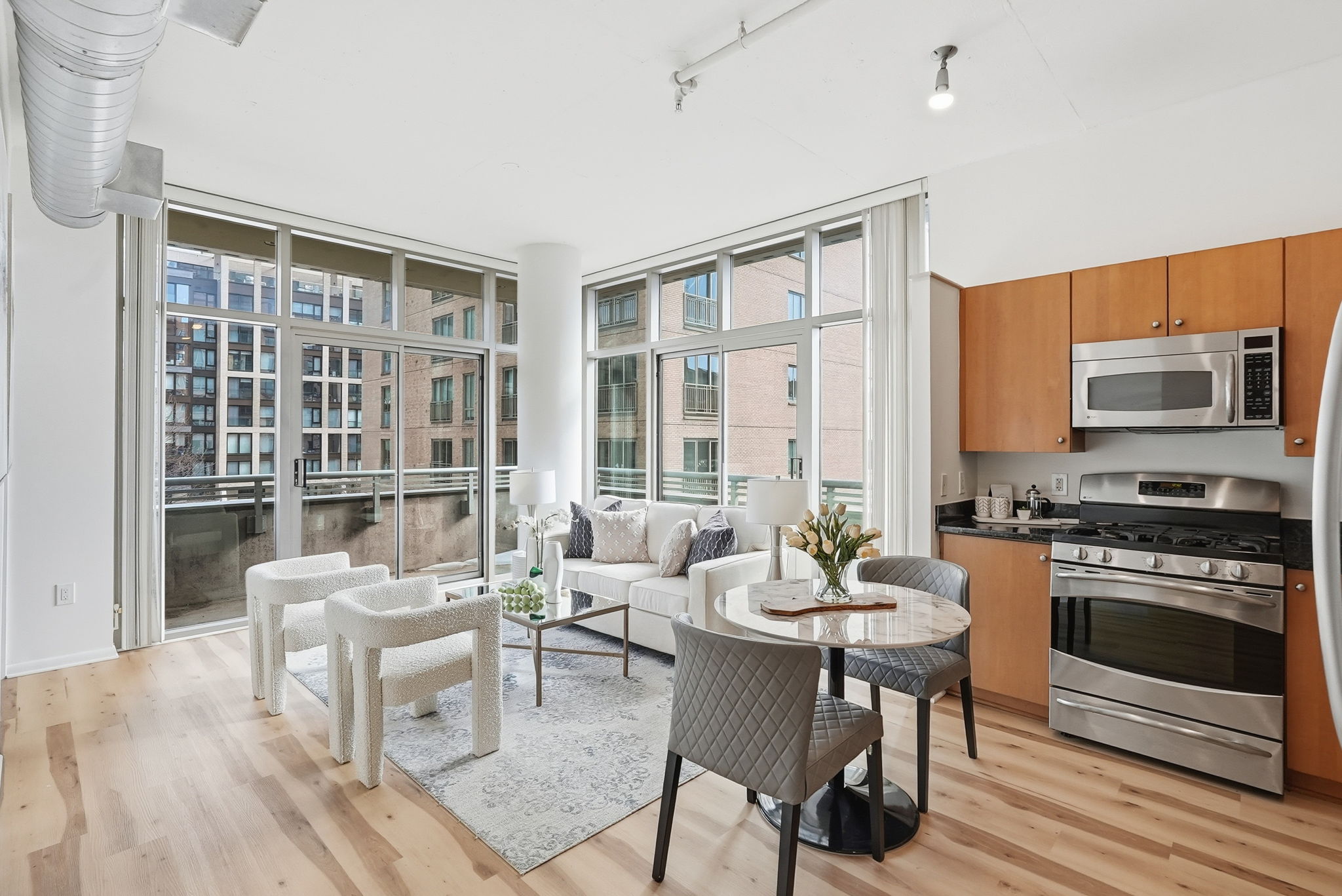 Open Concept Living w/ Sliding Doors to Balcony
