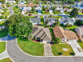 Aerial Front Elevation with Large Corner Lot and ROOM FOR A POOL!