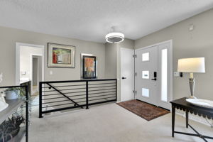 Front Foyer with Modern Railing