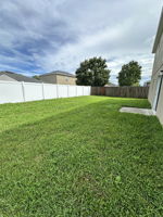Partially fenced backyard