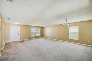 Foyer and view of living room