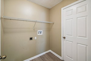 Inside laundry room with LVP flooring