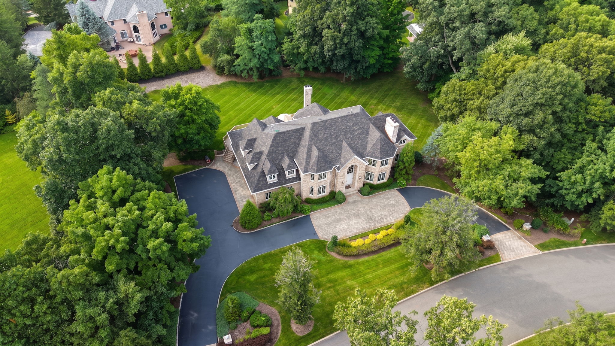 Set on more than an acre of professionally landscaped grounds in the top-rated Franklin Lakes school district, 817 Peach Tree Lane is a rare offering: a five-bedroom, six-full-and-two-half-bath estate custom-built in 1993 by its one and only owner, designed from the ground up for entertaining, and now ready to welcome its next chapter.